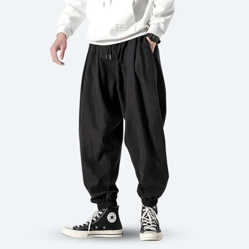 Men's ripped knee casual denim pants for a trendy street lookElastic - Ankle Men Casual Pant for a Trendy and Sporty VibeHarem Pants Men's ripped knee casual denim pants for a trendy street lookElastic - Ankle Men Casual Pant for a Trendy and Sporty VibeHarem Pants