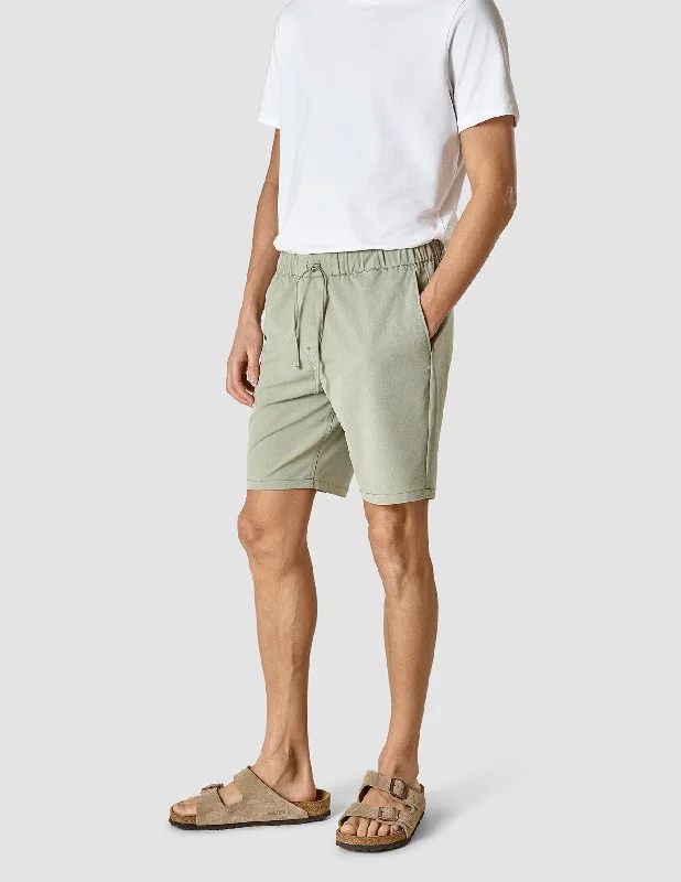 Men's high - waisted swim shorts with UPF protection for beach vacationsMesh - Lined Men Shorts for Enhanced Breathability during WorkoutsTech Linen Elastic Shorts Neutral Green Men's high - waisted swim shorts with UPF protection for beach vacationsMesh - Lined Men Shorts for Enhanced Breathability during WorkoutsTech Linen Elastic Shorts Neutral Green