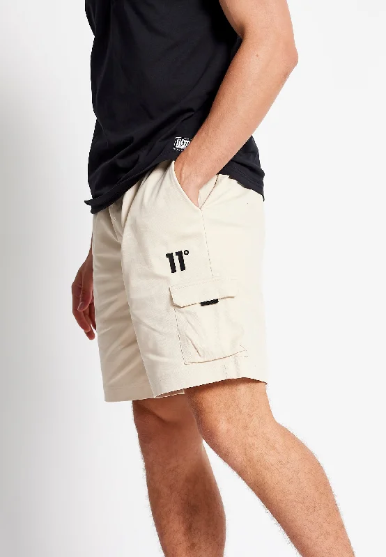 Men's ripped cargo pants for a trendy and edgy streetwear lookCargo Pants with Built - in Knee Pads for Protection during Work or SportsWoven Cargo Shorts - Stone Men's ripped cargo pants for a trendy and edgy streetwear lookCargo Pants with Built - in Knee Pads for Protection during Work or SportsWoven Cargo Shorts - Stone
