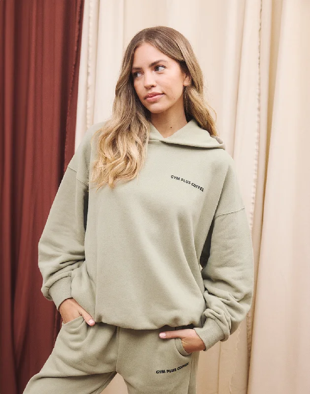 Retro - inspired men hoodie with a varsity logoFur - Lined Hood Men Hoodie for a Luxurious and Warm FeelPrint Hoodie in Olive Green Retro - inspired men hoodie with a varsity logoFur - Lined Hood Men Hoodie for a Luxurious and Warm FeelPrint Hoodie in Olive Green