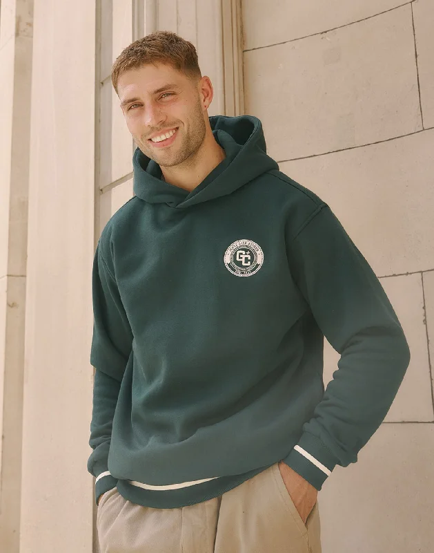 Oversized men hoodie with dropped shoulders for a streetwear lookDrawstring - Adjustable Men Hoodie for a Custom FitVarsity Hoodie in Mountain Green Oversized men hoodie with dropped shoulders for a streetwear lookDrawstring - Adjustable Men Hoodie for a Custom FitVarsity Hoodie in Mountain Green