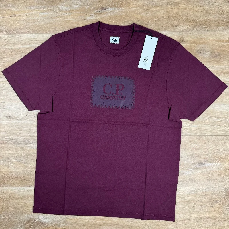 Men's eco - friendly recycled t - shirts for sustainable fashion choicesC.P. Company Stitch Block Logo T-Shirt in Potent Purple Men's eco - friendly recycled t - shirts for sustainable fashion choicesC.P. Company Stitch Block Logo T-Shirt in Potent Purple