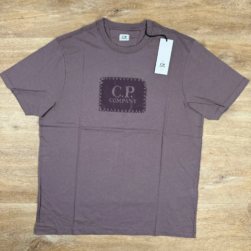 Men's eco - friendly recycled t - shirts for sustainable fashion choicesC.P. Company Stitch Block Logo T-Shirt in Purple Dove Men's eco - friendly recycled t - shirts for sustainable fashion choicesC.P. Company Stitch Block Logo T-Shirt in Purple Dove