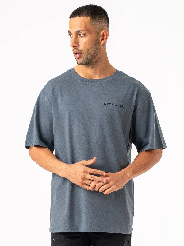 Men's button - front t - shirts with a unique artistic printEnergy Oversized T-Shirt - Petrol Men's button - front t - shirts with a unique artistic printEnergy Oversized T-Shirt - Petrol