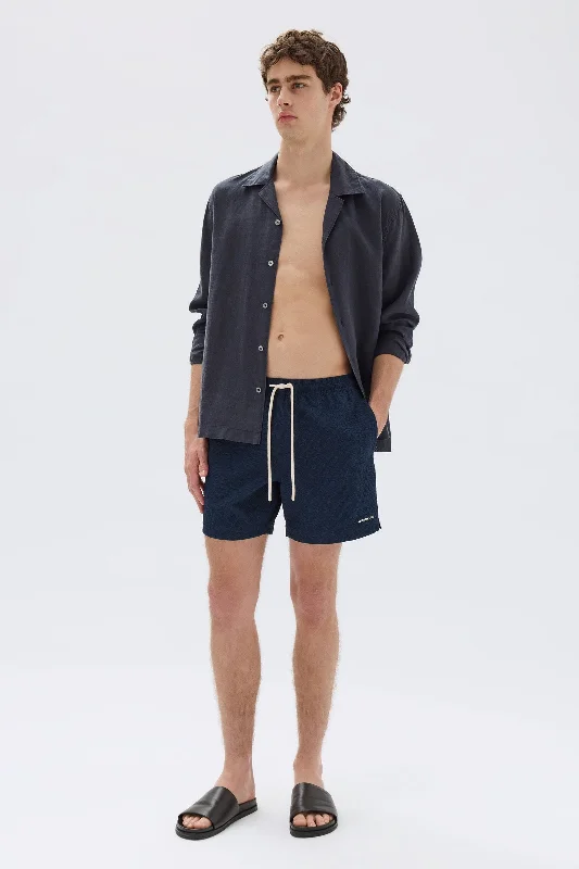 Men's ripped denim shorts for a trendy streetwear aesthetic   Seth Swim Short