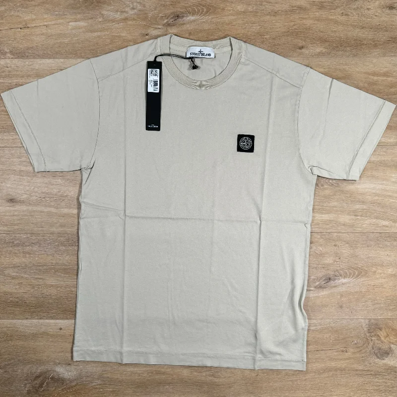 Men's eco - friendly recycled t - shirts for sustainable fashion choicesStone Island Patch Logo T-Shirt in Plaster Men's eco - friendly recycled t - shirts for sustainable fashion choicesStone Island Patch Logo T-Shirt in Plaster